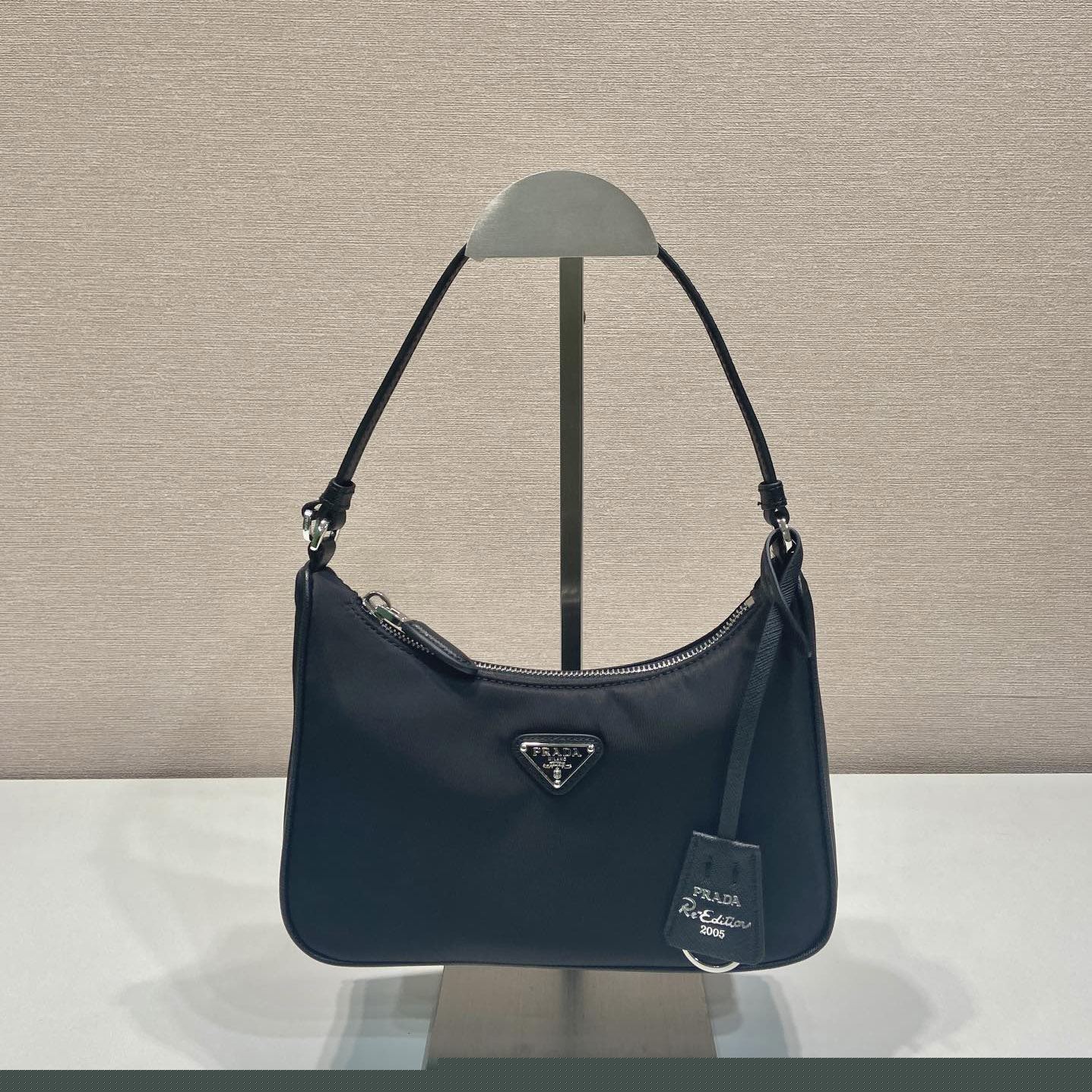 Pra*a top handle bags